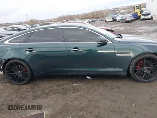 2015 Jaguar XJ Portfolio z VIN SAJWJ2GD7F8V84372, wystawiony jako IAAI lot #41489177 z przebiegiem 78 891 mil mil oraz . Historia ofert i sprzedaży dostępna na DreamBid. Obrazek 13.