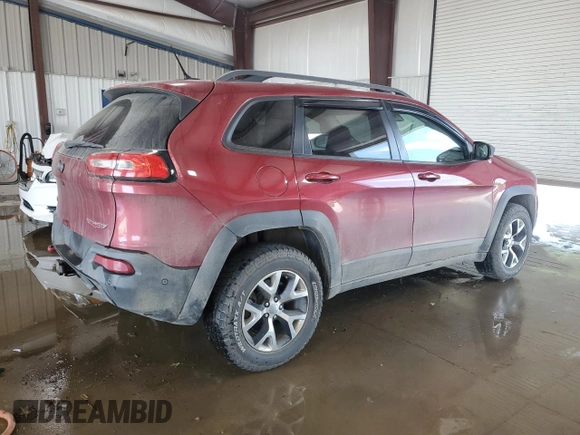 2015 Jeep Cherokee Trailhawk z VIN 1C4PJMBB7FW500180, wystawiony jako Copart lot #62385655 z przebiegiem 88 137 mil mil oraz Szkoda całkowita • Salvage title. Historia ofert i sprzedaży dostępna na DreamBid. Obrazek 3.