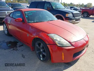 2004 Nissan 350Z Enthusiast with VIN JN1AZ34D44M102606, listed as a IAAI auction lot 41123390 with 174,603 mi miles. Bid and sale history available at carsss.com. Image 1.