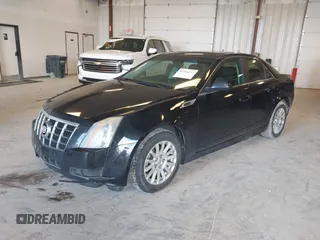 2012 Cadillac CTS with VIN 1G6DC5E55C0140174, listed as a IAAI auction lot 42186323 with 187,692 mi miles and . Bid and sale history available at DreamBid. Image 2.