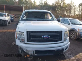 2014 Ford F-150 XL with VIN 1FTFX1EF0EFA23615, listed as a IAAI auction lot 41443935 with 241,426 mi miles. Bid and sale history available at carsss.com. Image 12.