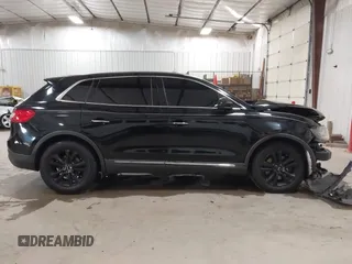 2016 Lincoln MKX Premiere with VIN 2LMTJ6JR4GBL75053, listed as a IAAI auction lot 41020450 with 120,930 mi miles. Bid and sale history available at carsss.com. Image 13.