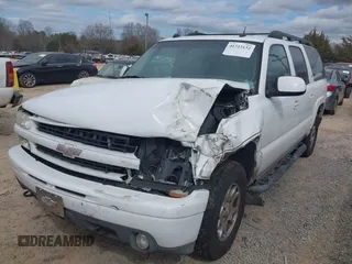 2005 Chevrolet Suburban LT z VIN 3GNEC16Z05G221875, wystawiony jako IAAI lot #41723132 z przebiegiem 253 542 mil mil oraz . Historia ofert i sprzedaży dostępna na DreamBid. Obrazek 6.