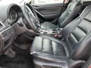 2016 Mazda CX-5 Grand Touring with VIN JM3KE4DY0G0820954, listed as a Copart auction lot 48027785 with 152,448 mi miles and Salvage Title. Bid and sale history available at carsss.com. Image 7.