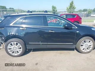2018 Cadillac XT5 Premium Luxury AWD with VIN 1GYKNFRS1JZ195373, listed as a IAAI auction lot 42583745 with 64,978 mi miles and . Bid and sale history available at DreamBid. Image 14.