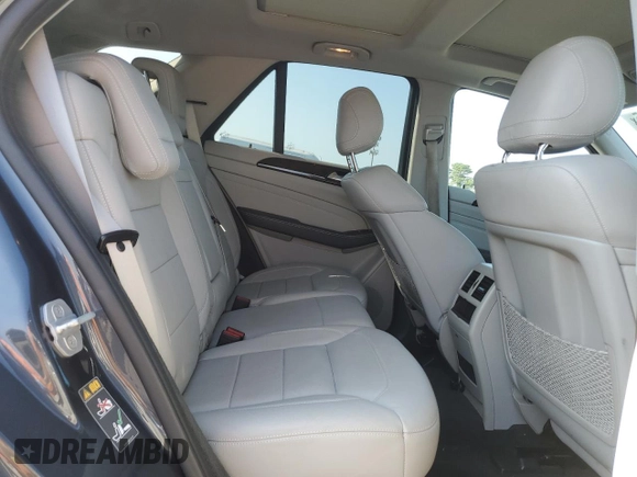 2015 Mercedes-Benz M 350 with VIN 4JGDA5HB2FA555743, listed as a Copart auction lot 65165695 with 147,152 mi miles and Salvage title. Bid and sale history available at DreamBid. Image 11.