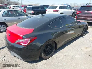 2013 Hyundai Genesis Coupe 2.0T R-Spec with VIN KMHHT6KD5DU081651, listed as a IAAI auction lot 41698837 with 137,208 mi miles. Bid and sale history available at carsss.com. Image 4.