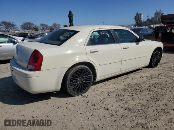 2005 Chrysler 300 with VIN 2C3JA43R75H161102, listed as a Copart auction lot 50101015 with 88,027 mi miles and Salvage Title. Bid and sale history available at carsss.com. Image 3.