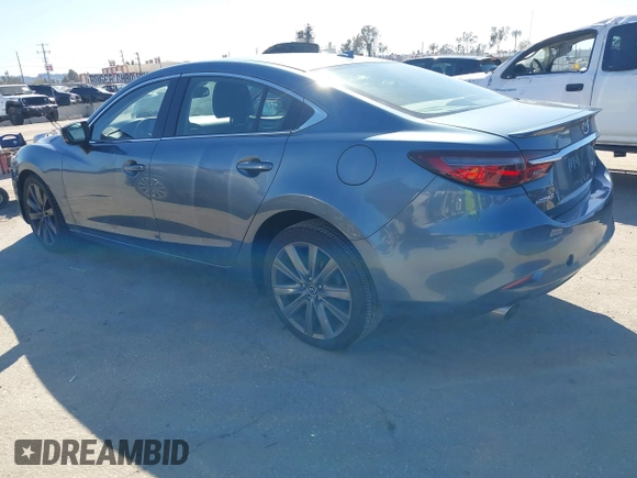 2018 Mazda 6 Grand Touring with VIN JM1GL1TY4J1333021, listed as a IAAI auction lot 41818719 with 56,188 mi miles and . Bid and sale history available at DreamBid. Image 3.