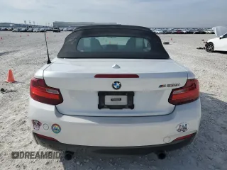 2016 BMW 2 Series M235i with VIN WBA1M1C52GV394052, listed as a Copart auction lot 82261594 with 83,979 mi miles and Salvage Title. Bid and sale history available at carsss.com. Image 6.