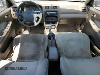 1998 Mazda Protege DX z VIN JM1BC1414W0203670, wystawiony jako Copart lot #62966544 z przebiegiem 249 405 mil mil oraz Szkoda całkowita • Salvage title. Historia ofert i sprzedaży dostępna na DreamBid. Obrazek 8.