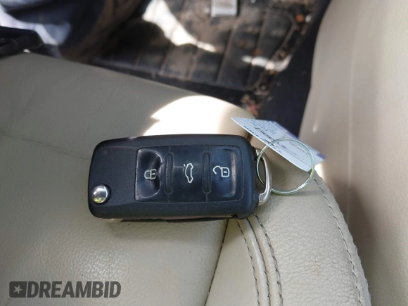 2012 Volkswagen Tiguan SEL with VIN WVGAV7AX8CW536752, listed as a IAAI auction lot 41798619 with 128,223 mi miles and . Bid and sale history available at DreamBid. Image 11.