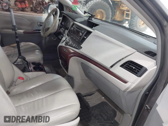 2011 Toyota Sienna XLE AAS with VIN 5TDYK3DC0BS063232, listed as a IAAI auction lot 42433187 with 198,252 mi miles and . Bid and sale history available at DreamBid. Image 5.