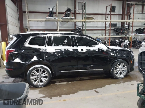 2022 Cadillac XT6 Premium Luxury with VIN 1GYKPDRS7NZ112856, listed as a IAAI auction lot 41328577 with 1 mi miles. Bid and sale history available at carsss.com. Image 13.