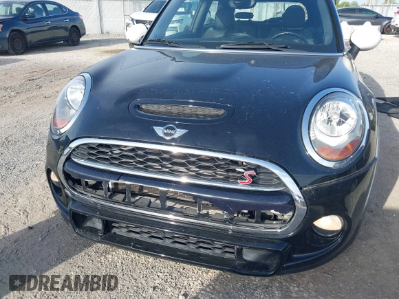 2016 MINI Hardtop S with VIN WMWXP7C53G2A42932, listed as a IAAI auction lot 42461469 with 76,038 mi miles and . Bid and sale history available at DreamBid. Image 6.