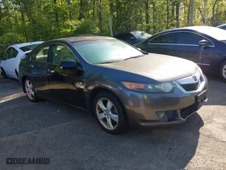 2009 Acura TSX with VIN JH4CU26639C017278, listed as a IAAI auction lot 42142592 with 245,654 mi miles. Bid and sale history available at carsss.com. Image 1.