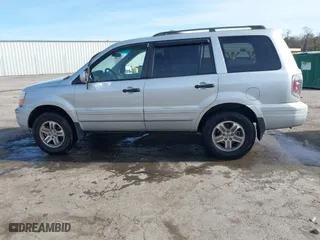 2004 Honda Pilot EX with VIN 2HKYF18634H515163, listed as a IAAI auction lot 40786017 with 206,036 mi miles. Bid and sale history available at carsss.com. Image 14.