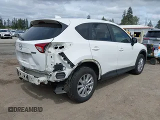 2015 Mazda CX-5 Touring with VIN JM3KE4CY4F0488484, listed as a IAAI auction lot 42115093 with 156,344 mi miles. Bid and sale history available at carsss.com. Image 4.