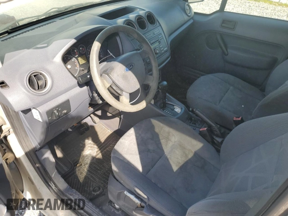 2010 Ford Transit Connect XLT with VIN NM0KS9BN3AT017436, listed as a Copart auction lot 50759565 with 164,798 mi miles and Salvage title. Bid and sale history available at DreamBid. Image 8.