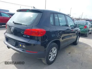 2012 Volkswagen Tiguan SE with VIN WVGAV7AXXCW526403, listed as a IAAI auction lot 41852974 with 125,376 mi miles and . Bid and sale history available at DreamBid. Image 4.