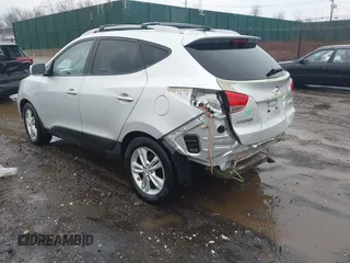 2011 Hyundai Tucson Limited with VIN KM8JUCAC9BU200367, listed as a IAAI auction lot 41867617 with 228,456 mi miles and . Bid and sale history available at DreamBid. Image 3.