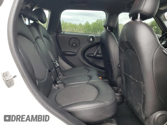 2015 MINI Countryman S with VIN WMWZC5C58FWP46931, listed as a Copart auction lot 59183495 with 105,731 mi miles and Salvage title. Bid and sale history available at DreamBid. Image 10.