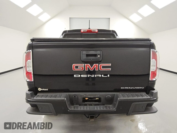 2021 GMC Canyon 4WD Denali with VIN 1GTG6EEN4M1118552, listed as a Copart auction lot 44969445 with 37,357 mi miles and Clean Title. Bid and sale history available at carsss.com. Image 6.