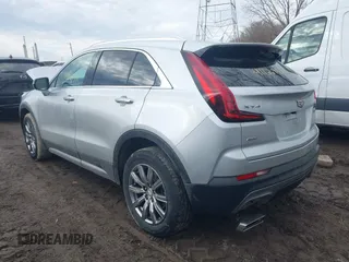 2022 Cadillac XT4 AWD Premium Luxury with VIN 1GYFZDR43NF152561, listed as a IAAI auction lot 41669571 with 16,274 mi miles and . Bid and sale history available at carsss.com. Image 3.