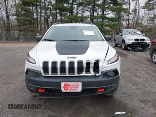 2016 Jeep Cherokee Trailhawk with VIN 1C4PJMBS7GW241076, listed as a IAAI auction lot 42020124 with 151,742 mi miles and . Bid and sale history available at DreamBid. Image 12.