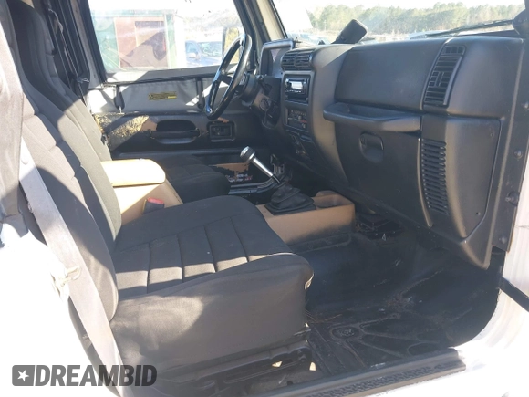 1997 Jeep Wrangler Sport with VIN 1J4FY19S7VP483735, listed as a IAAI auction lot 41469983 with 150,542 mi miles. Bid and sale history available at carsss.com. Image 5.