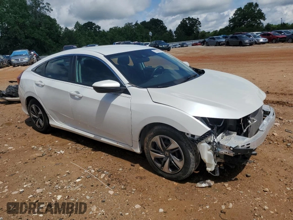 2020 Honda Civic LX z VIN 2HGFC2F64LH592299, wystawiony jako Copart lot #57040525 z przebiegiem 154 093 mil mil oraz Szkoda całkowita • Salvage title. Historia ofert i sprzedaży dostępna na DreamBid. Obrazek 4.