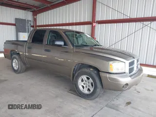 2007 Dodge Dakota SLT with VIN 1D7HE48N17S144088, listed as a IAAI auction lot 40577462 with 192,502 mi miles and . Bid and sale history available at carsss.com. Image 1.