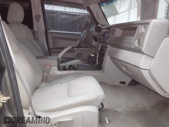 2006 Jeep Commander with VIN 1J8HG48KX6C263348, listed as a IAAI auction lot 42128039 with 208,605 mi miles and . Bid and sale history available at DreamBid. Image 5.