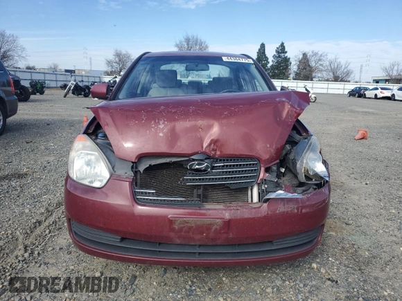 2011 Hyundai Accent GLS z VIN KMHCN4AC8BU534935, wystawiony jako Copart lot #44384775 z przebiegiem 137 328 mil mil oraz Szkoda całkowita • Salvage title. Historia ofert i sprzedaży dostępna na DreamBid. Obrazek 5.
