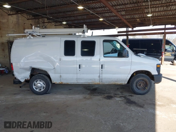 2012 Ford Econoline Cargo Commercial with VIN 1FTNE1EW3CDA31914, listed as a IAAI auction lot 41622154 with 99,254 mi miles and . Bid and sale history available at carsss.com. Image 13.