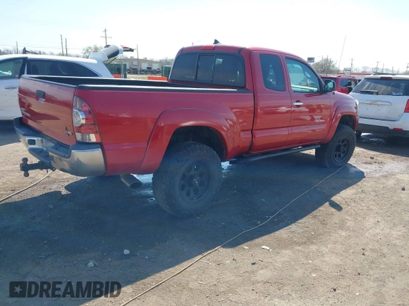 2014 Toyota Tacoma with VIN 5TFUU4EN7EX084785, listed as a IAAI auction lot 41879329 with 133,216 mi miles and . Bid and sale history available at DreamBid. Image 4.
