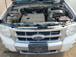 2012 Ford Escape Hybrid z VIN 1FMCU5K3XCKA58465, wystawiony jako Copart lot #75527194 z przebiegiem 263 996 mil mil oraz Szkoda całkowita • Salvage title. Historia ofert i sprzedaży dostępna na DreamBid. Obrazek 13.
