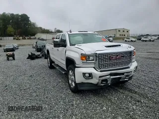 2019 GMC Sierra 2500HD Denali z VIN 1GT12SEY8KF150379, wystawiony jako Copart lot #80525704 z przebiegiem Nie podano mil oraz Szkoda całkowita • Salvage title. Historia ofert i sprzedaży dostępna na DreamBid. Obrazek 11.