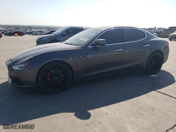 2014 Maserati Ghibli S Q4 with VIN ZAM57RTA7E1085782, listed as a Copart auction lot 75537634 with 111,616 mi miles and Salvage Title. Bid and sale history available at carsss.com. Image 1.