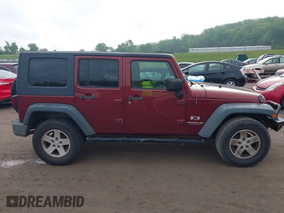 2008 Jeep Wrangler Unlimited X with VIN 1J4GA39108L606685, listed as a IAAI auction lot 41965538 with 288,946 mi miles. Bid and sale history available at carsss.com. Image 13.