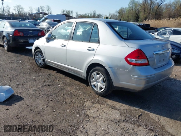2011 Nissan Versa 1.8 S with VIN 3N1BC1AP5BL432979, listed as a IAAI auction lot 41932890 with 150,041 mi miles. Bid and sale history available at carsss.com. Image 3.