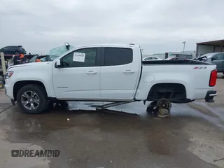 2019 Chevrolet Colorado 4WD Z71 z VIN 1GCGTDEN3K1317883, wystawiony jako IAAI lot #41439010 z przebiegiem 34 306 mil mil oraz . Historia ofert i sprzedaży dostępna na DreamBid. Obrazek 15.