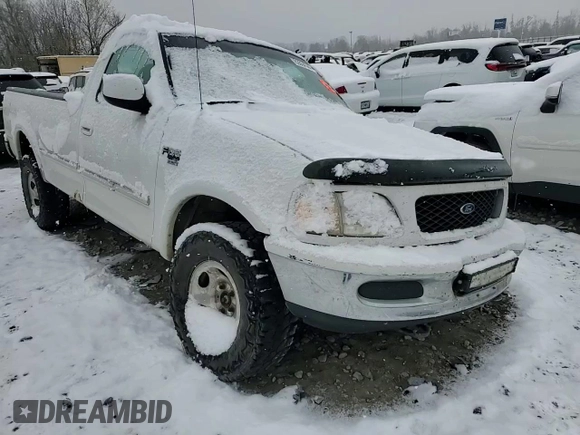 1998 Ford F-150 with VIN 1FTRF18L9WNB61551, listed as a Copart auction lot 82864544 with Not provided miles and Salvage title. Bid and sale history available at DreamBid. Image 11.
