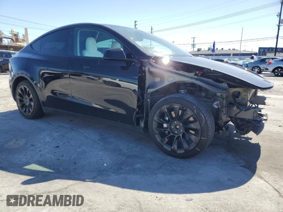 2022 Tesla Model Y Long Range z VIN 7SAYGDEE2NF442073, wystawiony jako Copart lot #49180135 z przebiegiem 34 742 mil mil oraz Szkoda całkowita • Salvage title. Historia ofert i sprzedaży dostępna na DreamBid. Obrazek 4.