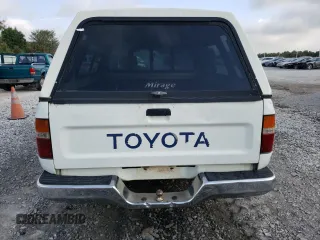 1993 Toyota Pickup DLX z VIN JT4RN93P7P5074129, wystawiony jako Copart lot #72893054 z przebiegiem 235 053 mil mil oraz Szkoda całkowita • Salvage title. Historia ofert i sprzedaży dostępna na DreamBid. Obrazek 6.