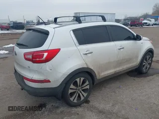 2013 Kia Sportage EX with VIN KNDPCCA24D7531349, listed as a IAAI auction lot 41601181 with 97,004 mi miles and . Bid and sale history available at DreamBid. Image 4.