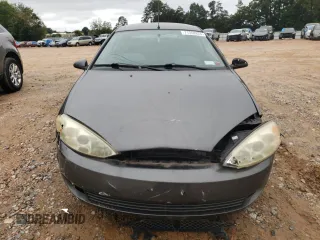 2001 Mercury Cougar z VIN 1ZWFT61L815625532, wystawiony jako Copart lot #71358824 z przebiegiem 94 767 mil mil oraz Szkody całkowita. Historia ofert i sprzedaży dostępna na DreamBid. Obrazek 5.
