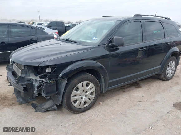 2019 Dodge Journey SE Value Pkg with VIN 3C4PDCAB8KT867916, listed as a IAAI auction lot 41549040 with 124,411 mi miles. Bid and sale history available at carsss.com. Image 17.