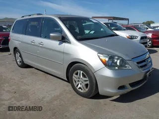 2005 Honda Odyssey EX-L with VIN 5FNRL38705B008884, listed as a IAAI auction lot 42081384 with 219,336 mi miles. Bid and sale history available at carsss.com. Image 1.