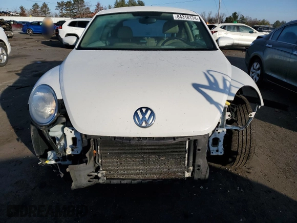 2014 Volkswagen Beetle 2.5L w/Sun with VIN 3VWJP7AT8EM610831, listed as a Copart auction lot 84318174 with 136,931 mi miles and Salvage Title. Bid and sale history available at DreamBid. Image 5.